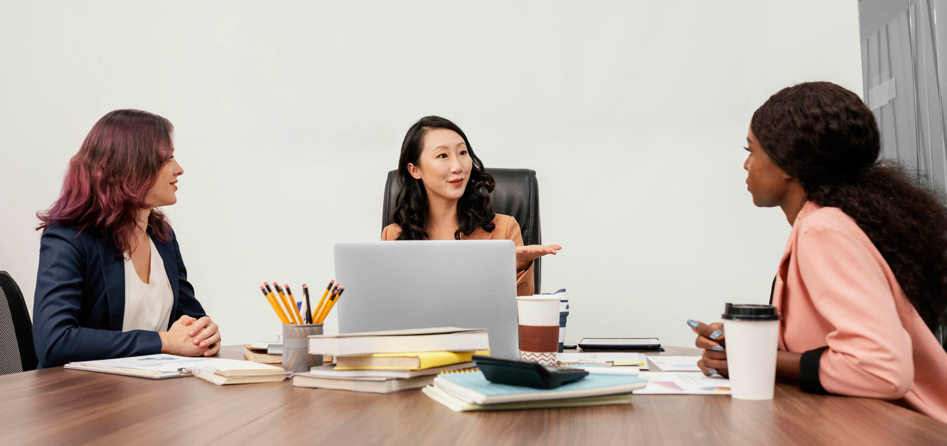 Asian man and woman in professional conversation